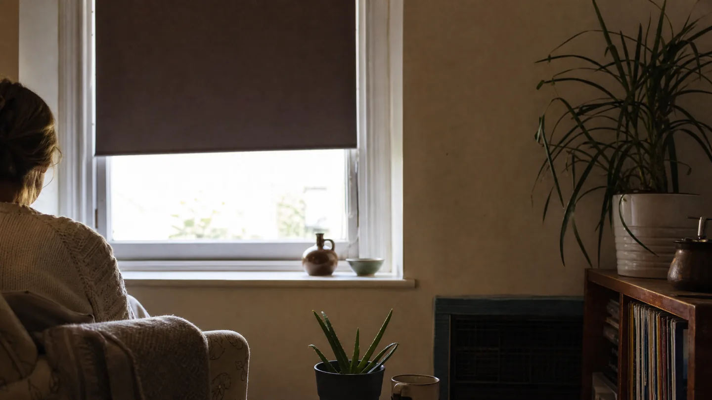 blackout curtain edge, daytime light behind