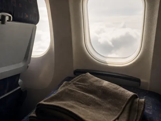 aircraft window, blanket, daylight